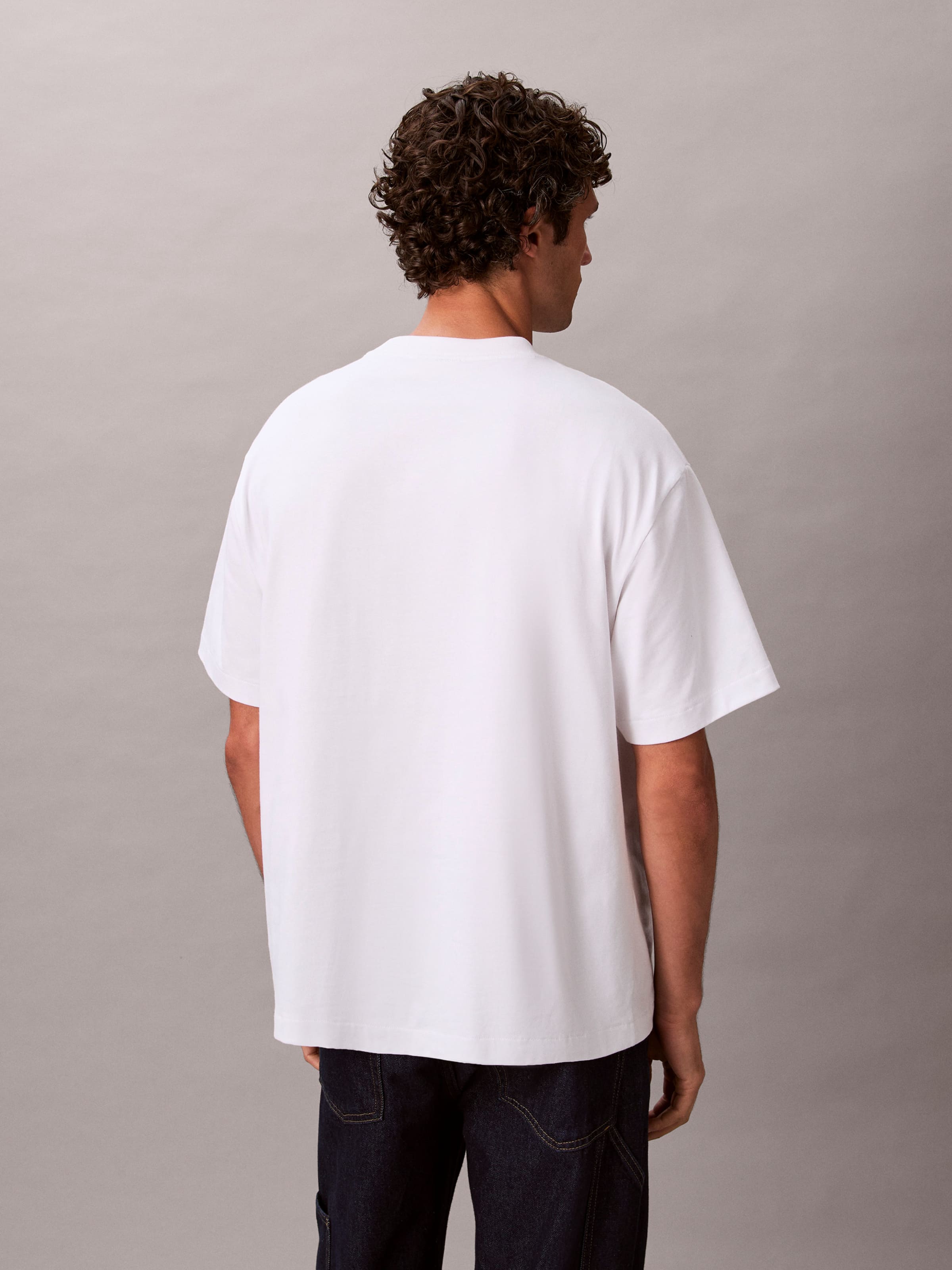 Relaxed Arch Logo In White